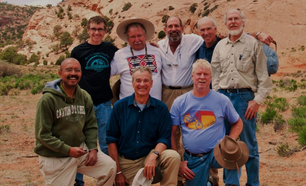 Promotional image for Traipsing Across the Colorado Plateau: (Mis)Adventures with Fred Blackburn program featuring the group on a Navajo trip.