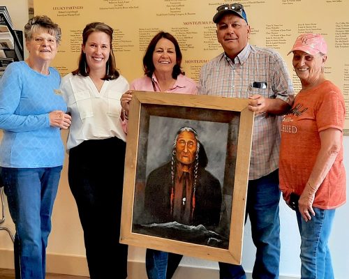 The Green family with museum staff, donating a portrait of Ute Chief, Jack House.